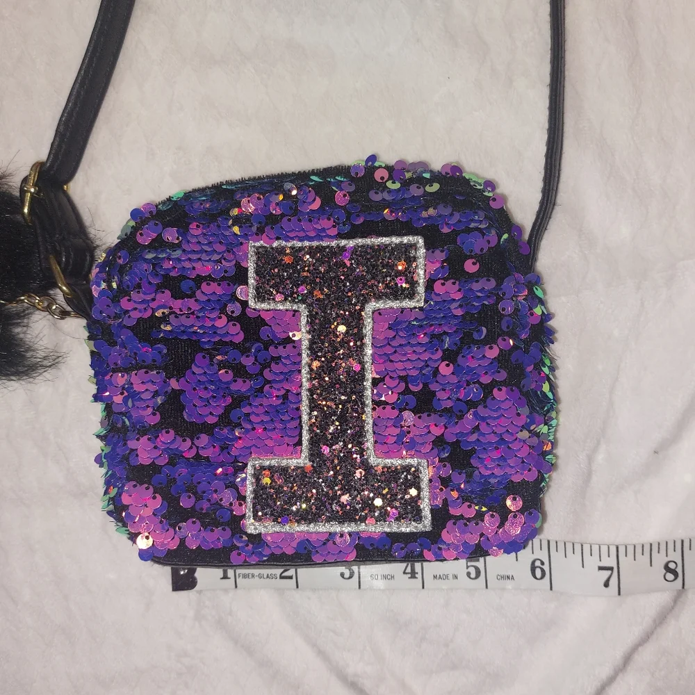 Justice initial I sequined purse